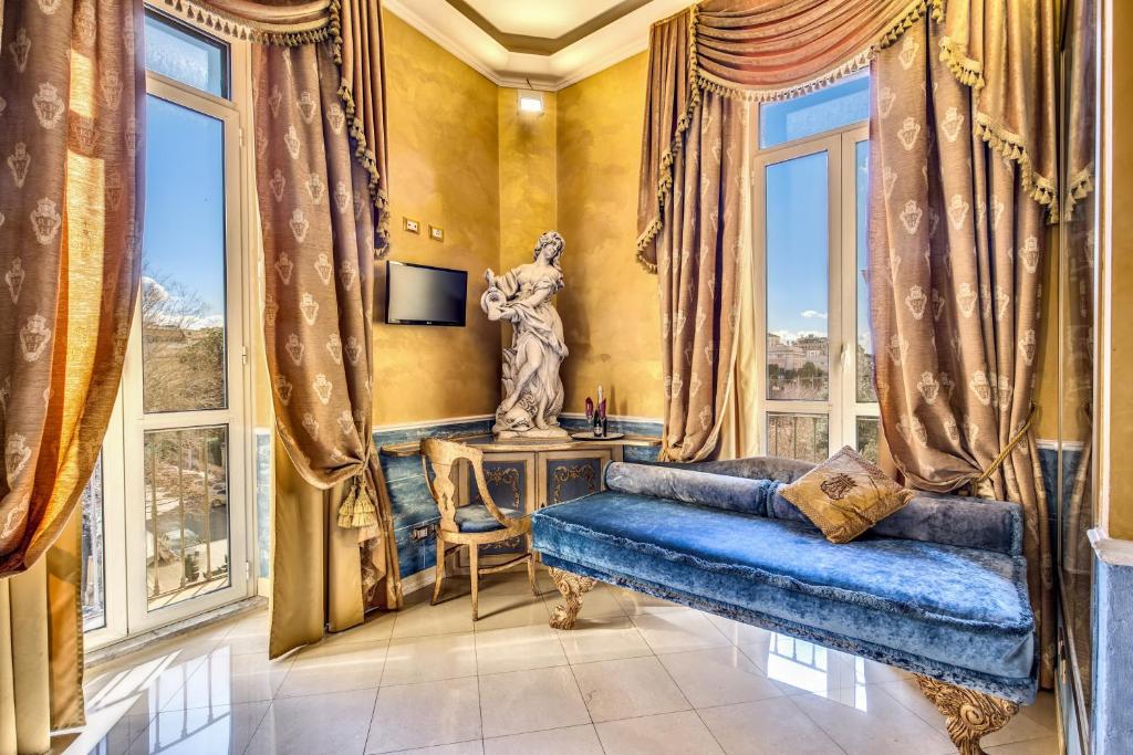 TV a/nebo společenská místnost v ubytování Romanico Palace Luxury Hotel & SPA
