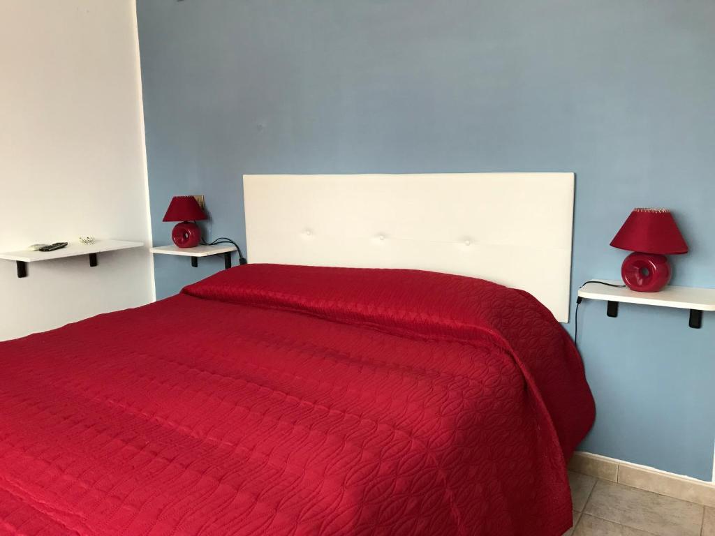 Postel nebo postele na pokoji v ubytování B&B New Triscele