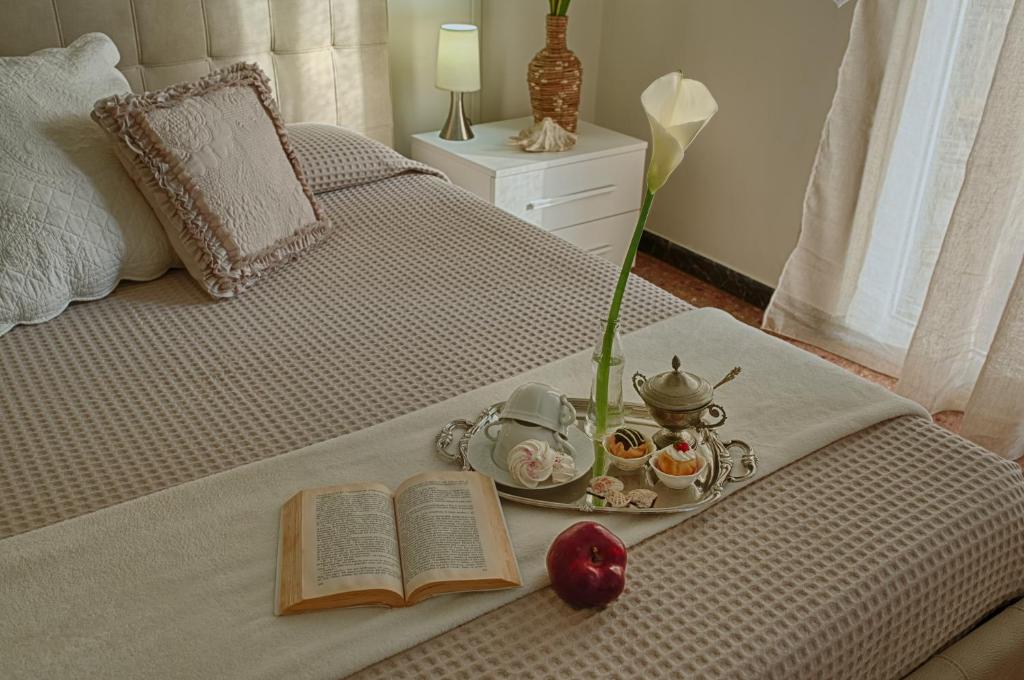 Letto o letti in una camera di B&B L'Arca Di Noè