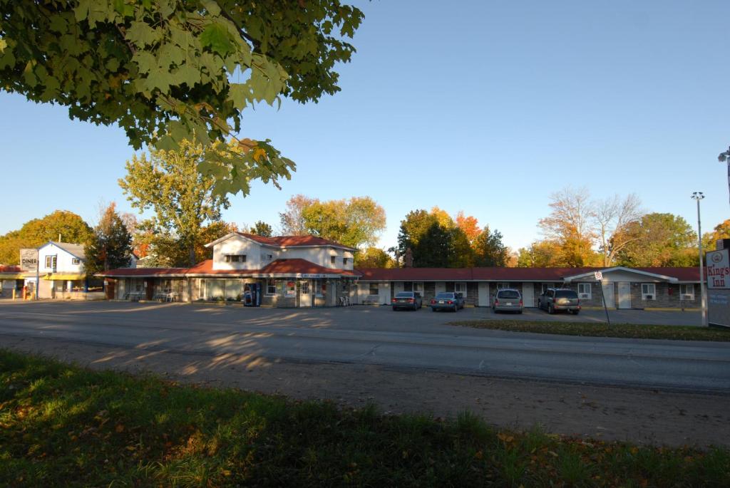 an empty parking lot in a small town at Kings Inn Orillia in Orillia