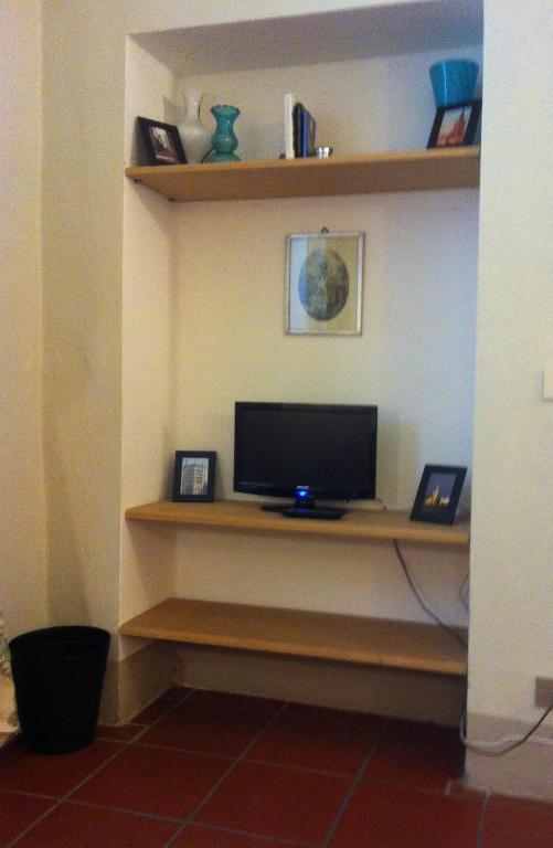 TV a/nebo společenská místnost v ubytování Luisa in Palazzo Bianchi