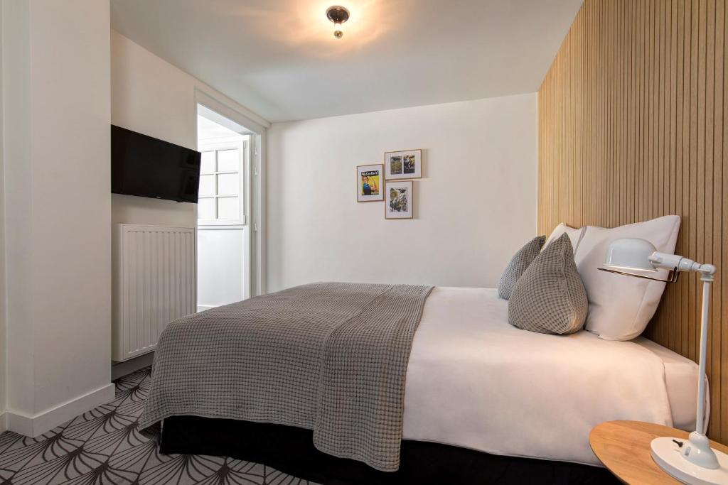 Postel nebo postele na pokoji v ubytování Vintage Hotel Brussels