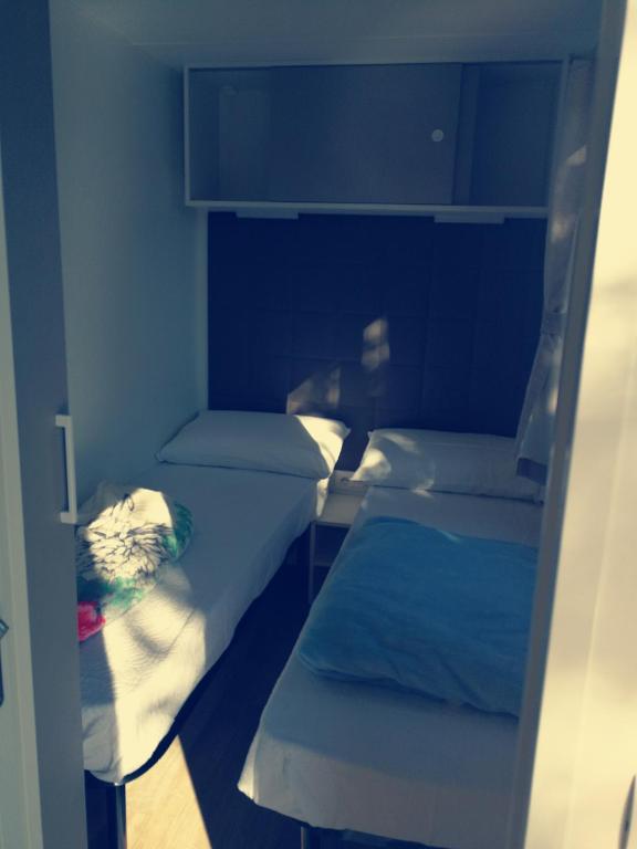 Postel nebo postele na pokoji v ubytování Parco Vacanze Makallè