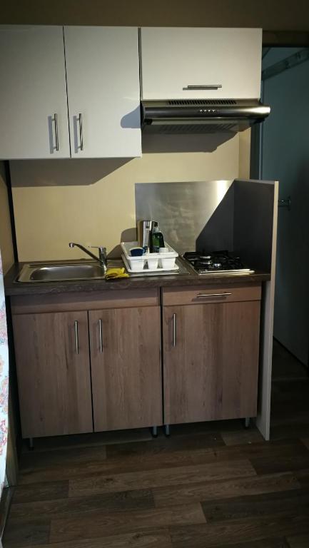 Kuchyň nebo kuchyňský kout v ubytování Parco Vacanze Makallè