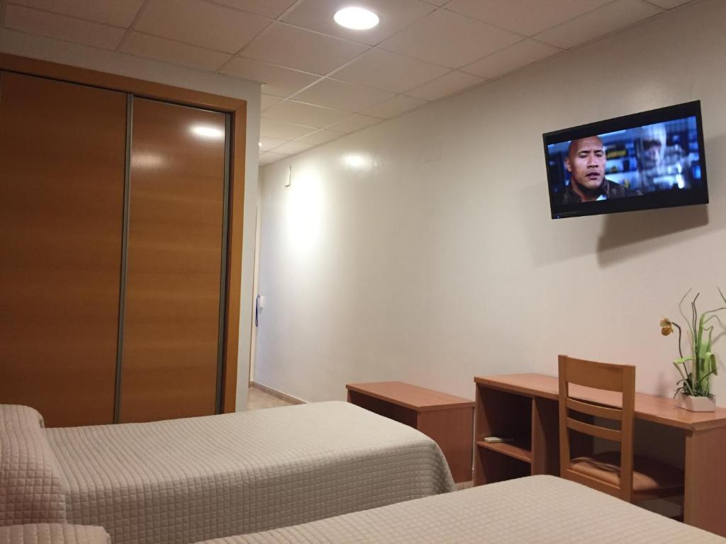 TV a/nebo společenská místnost v ubytování Hotel Mediterrani Blau