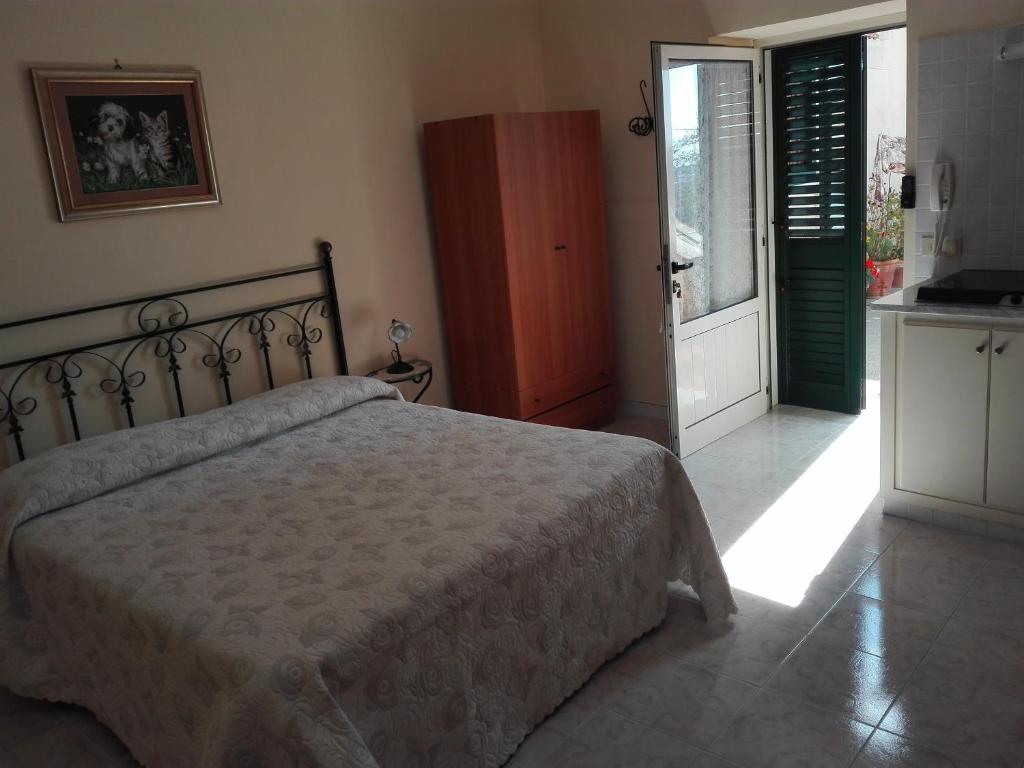 Postel nebo postele na pokoji v ubytování Casa Lorella