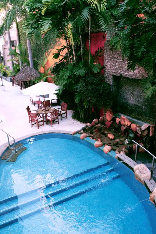 Bazén v ubytování Hotel Rio Malecon nebo v jeho okolí