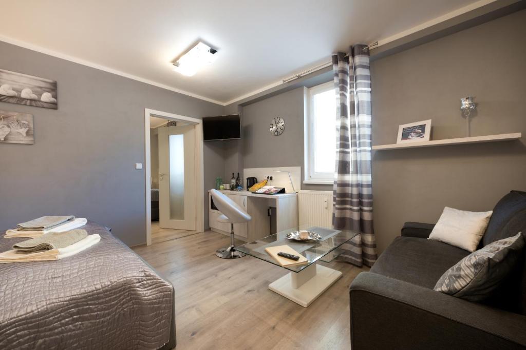 Postel nebo postele na pokoji v ubytování B2B Apartments