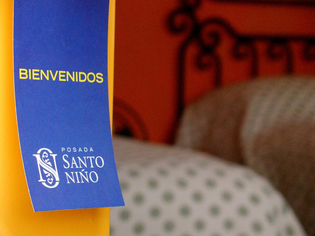 Postel nebo postele na pokoji v ubytování Hotel Posada Santo Niño