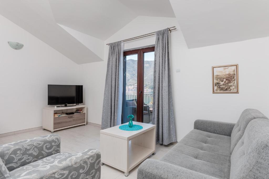 TV o dispositivi per l'intrattenimento presso Apartments Miramar
