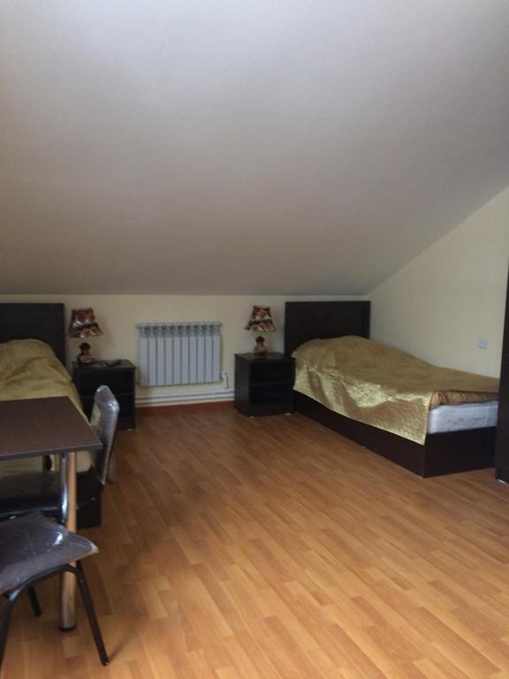 Postel nebo postele na pokoji v ubytování GuestHouse M22