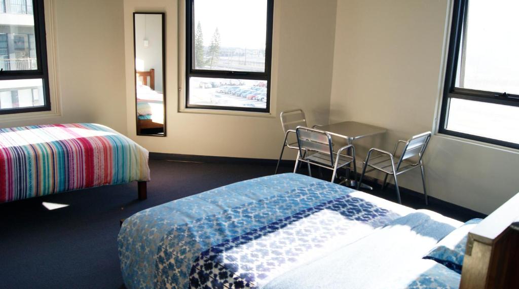 Postel nebo postele na pokoji v ubytování Australia Hotel Fremantle
