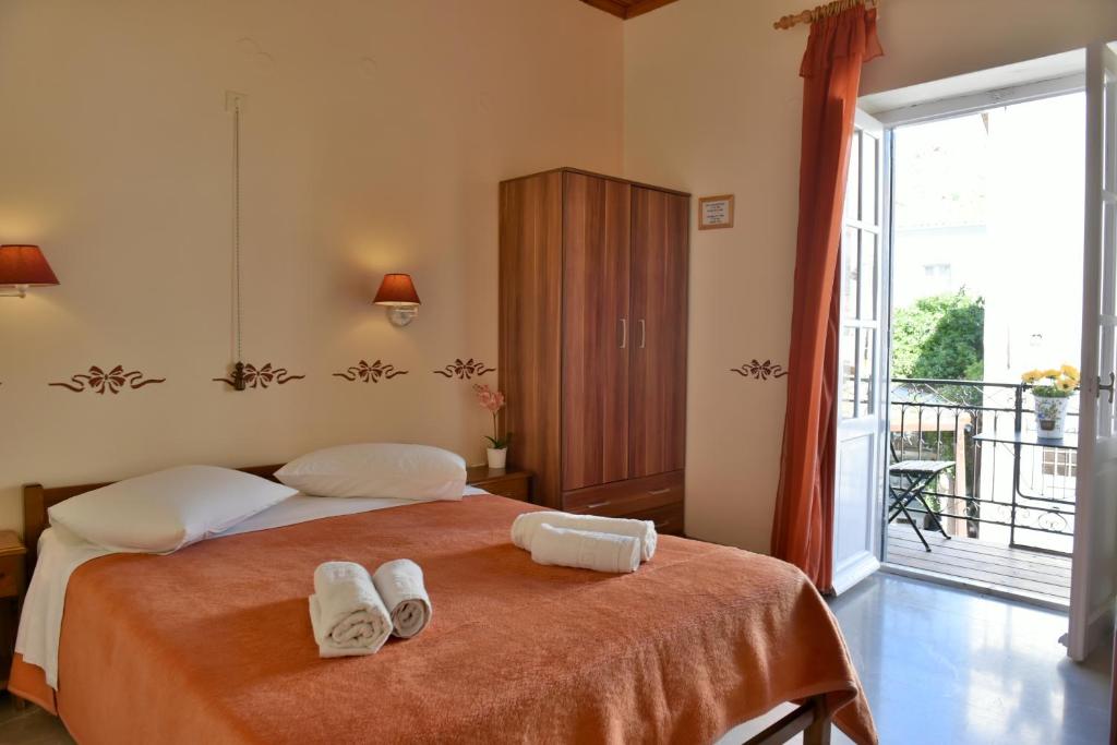 Postel nebo postele na pokoji v ubytování Guesthouse Corali