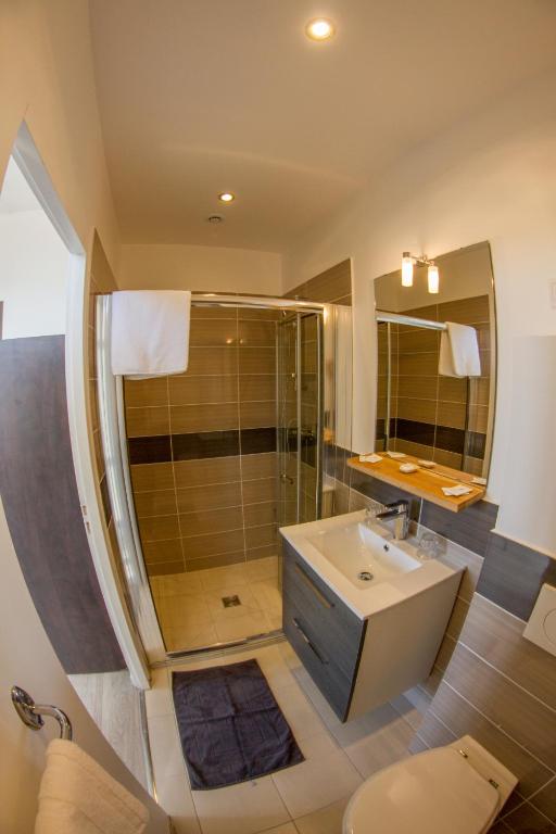 Koupelna v ubytování Hôtel Trianon