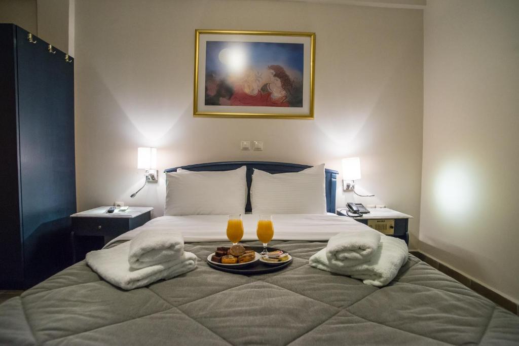 Postel nebo postele na pokoji v ubytování Anita Hotel