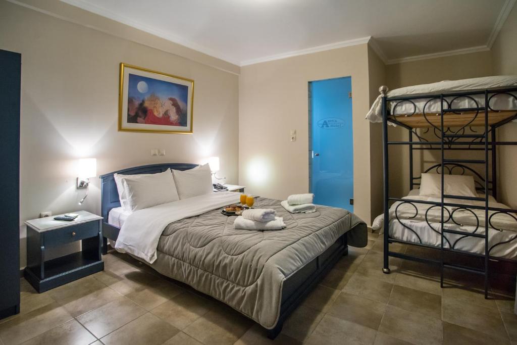 Postel nebo postele na pokoji v ubytování Anita Hotel