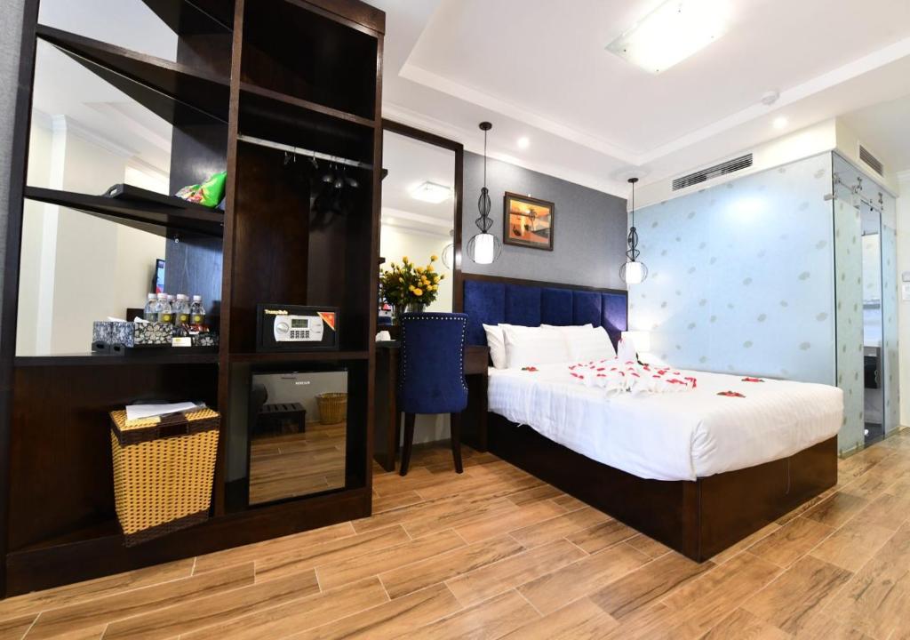 Giường trong phòng chung tại Bella Rosa Trendy Hotel & Spa