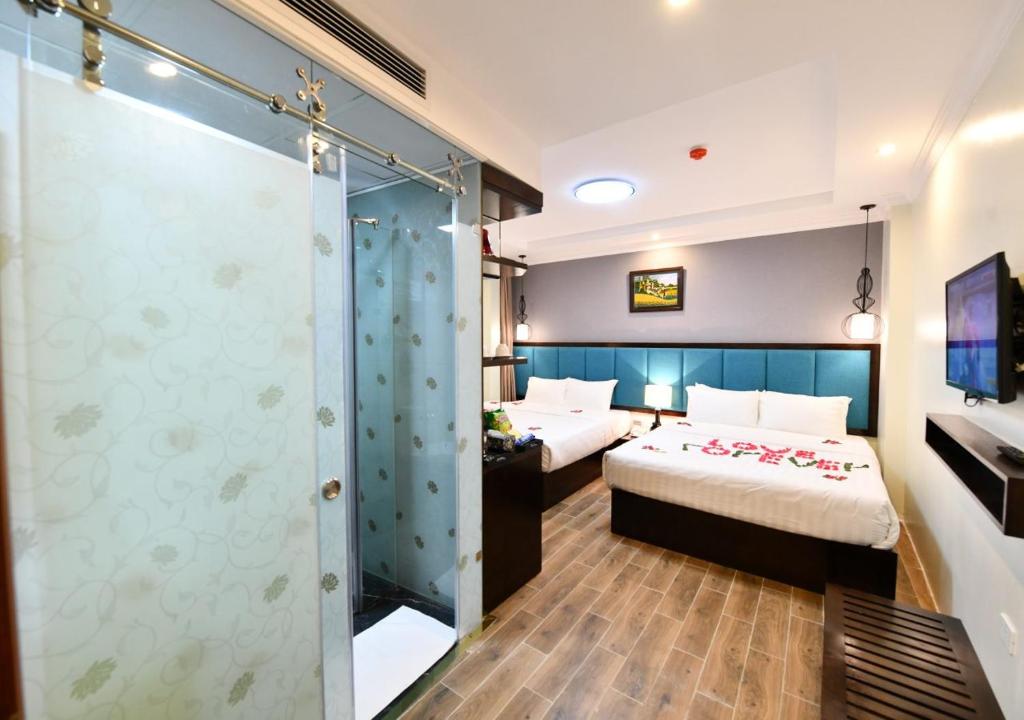 Postel nebo postele na pokoji v ubytování Bella Rosa Trendy Hotel & Spa