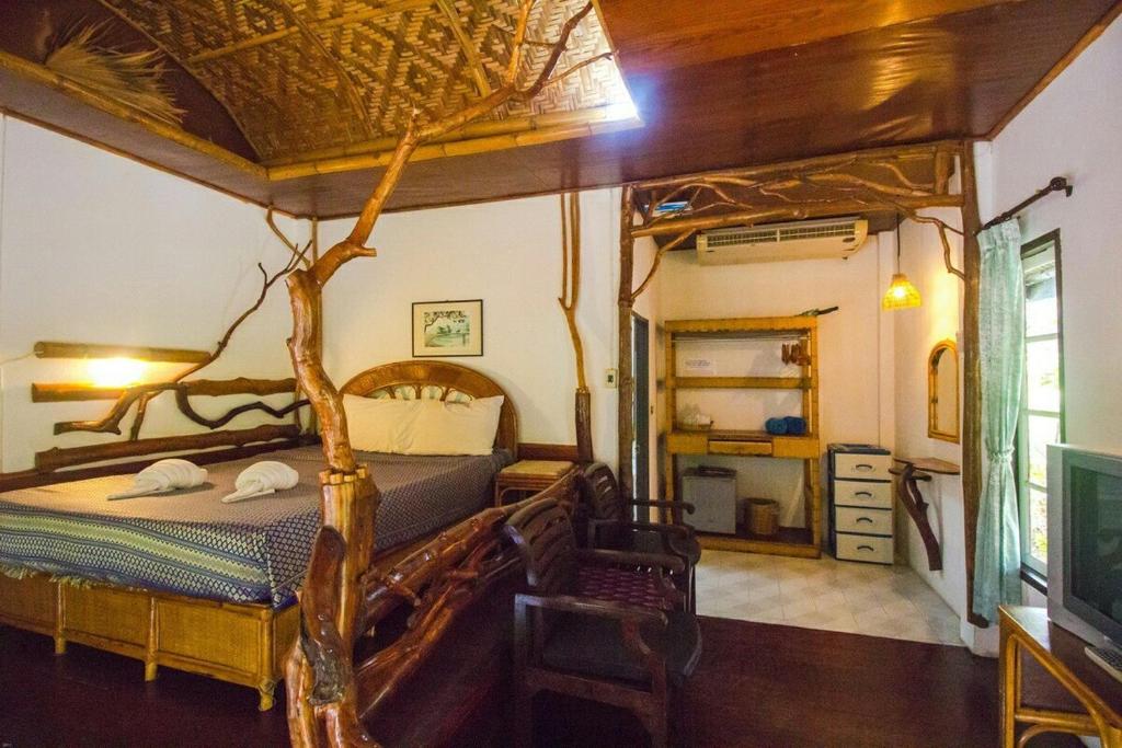 Postel nebo postele na pokoji v ubytování Bill Resort