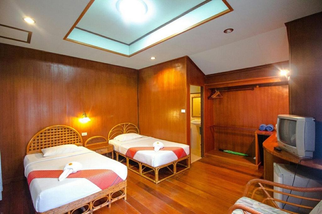 Postel nebo postele na pokoji v ubytování Bill Resort