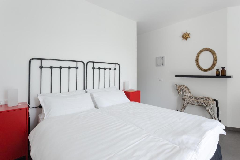 Postel nebo postele na pokoji v ubytování Minerva Residence