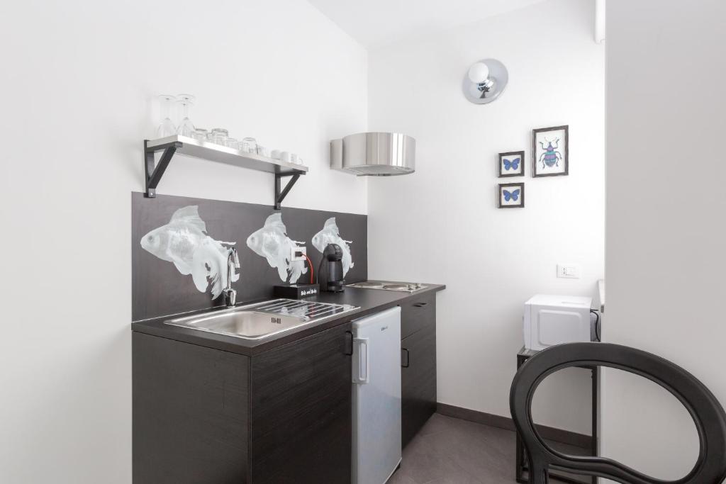 Kuchyň nebo kuchyňský kout v ubytování Minerva Residence