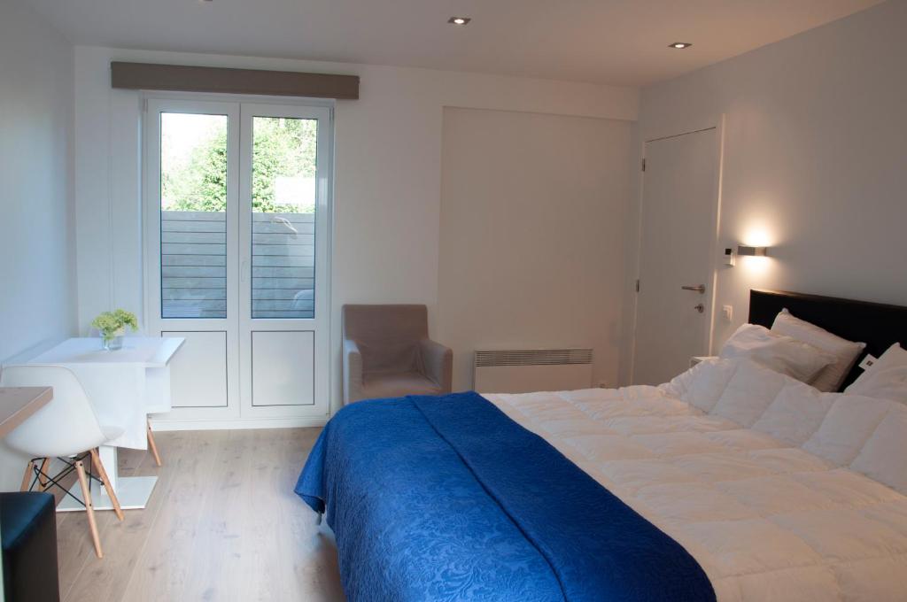 Postel nebo postele na pokoji v ubytování B&B Aquavit