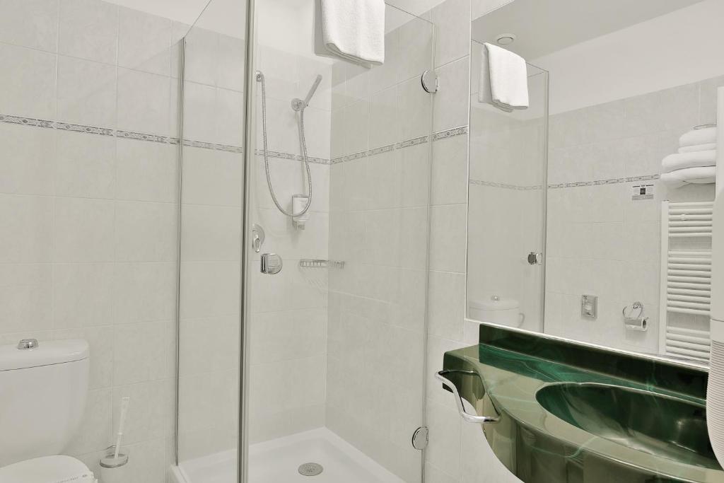 Kúpeľňa v ubytovaní Belvedere Wellness Hotel