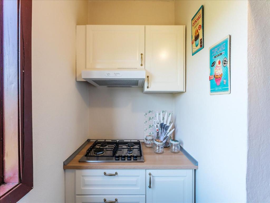 A kitchen or kitchenette at Santa Caterina Coastal Villa