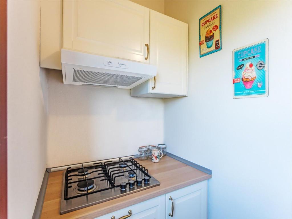 A kitchen or kitchenette at Santa Caterina Coastal Villa