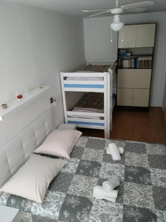 Postel nebo postele na pokoji v ubytování Apartment Doris