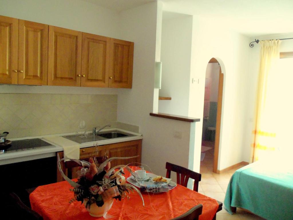A kitchen or kitchenette at Appartamenti Galatea
