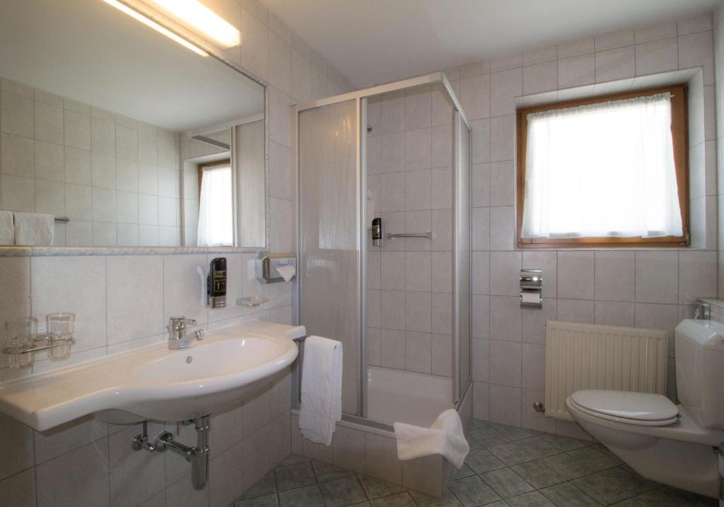 Koupelna v ubytování Hotel Munde