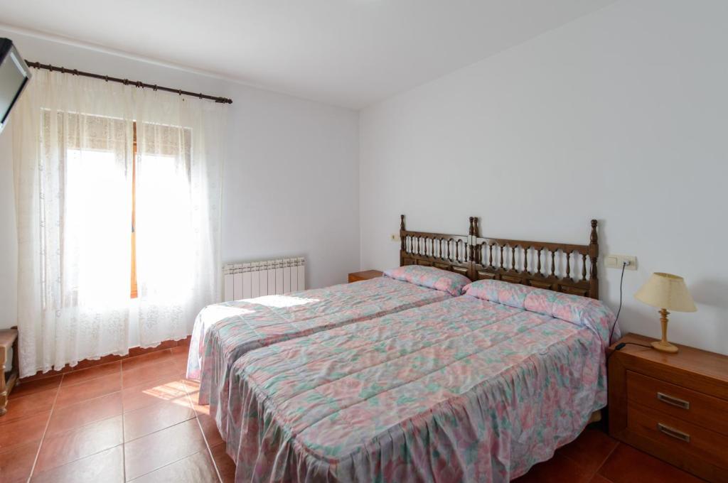 Posteľ alebo postele v izbe v ubytovaní Hostal Camino Real
