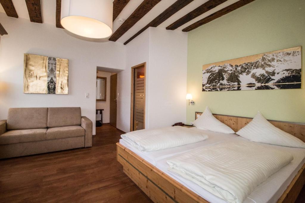 Postel nebo postele na pokoji v ubytování Hotel Munde