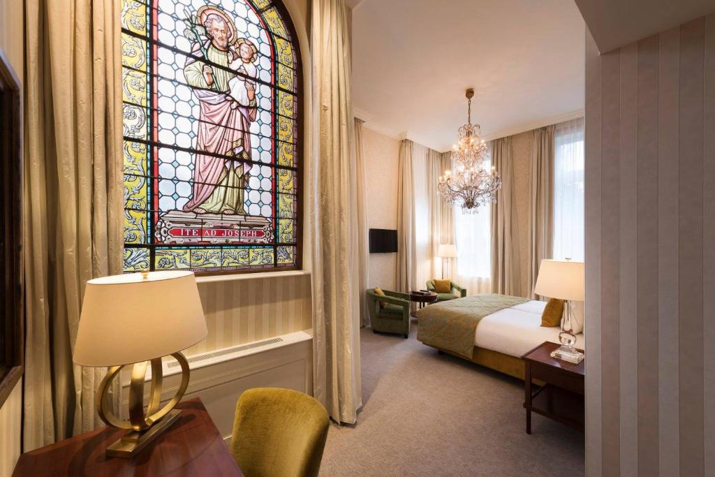 TV a/nebo společenská místnost v ubytování Dukes' Palace Brugge - by Dukes' Hotel Collection