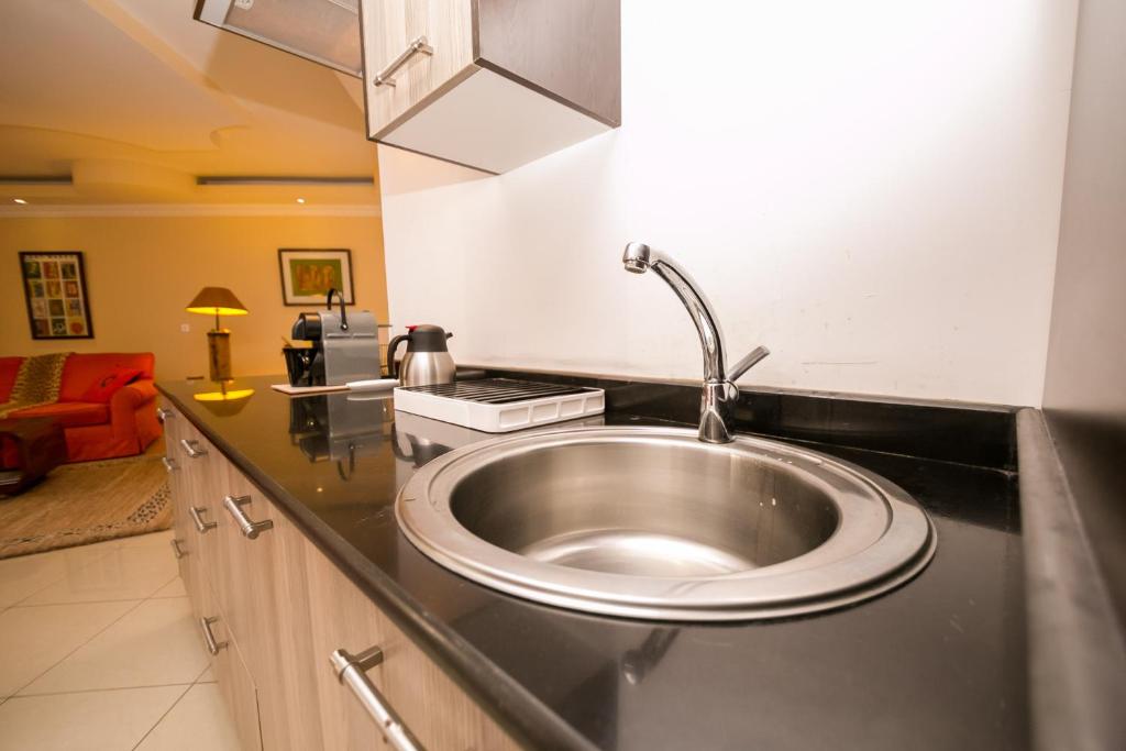 Kuchyň nebo kuchyňský kout v ubytování Hotel Rudi