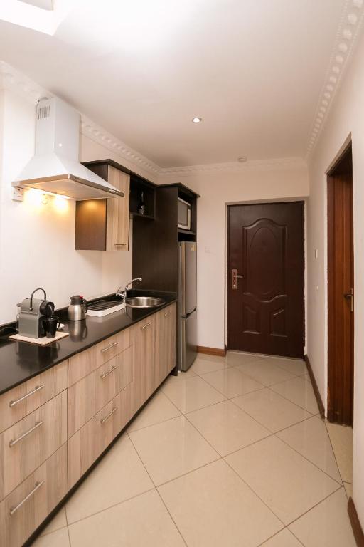 Kuchyň nebo kuchyňský kout v ubytování Hotel Rudi