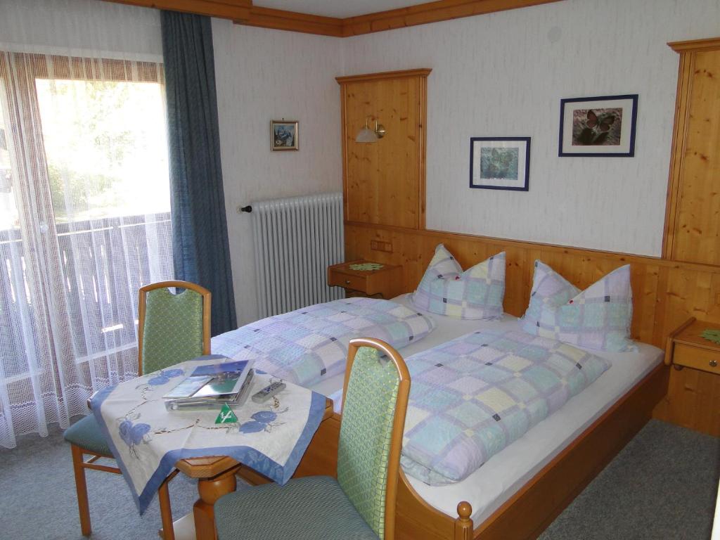 Postel nebo postele na pokoji v ubytování Pension Wildental