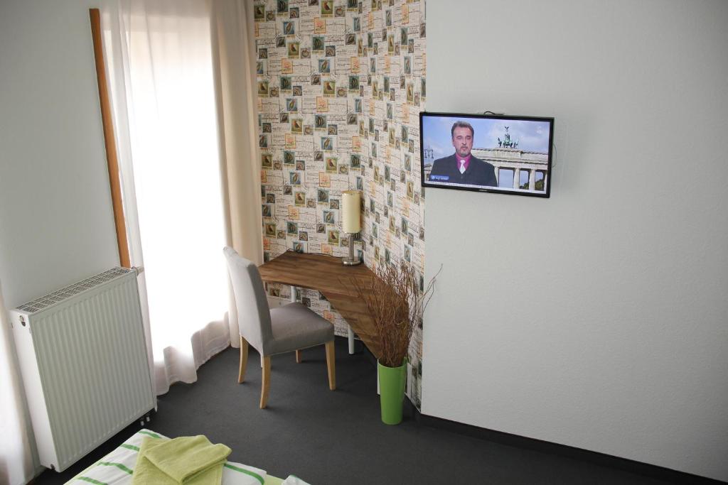 TV a/nebo společenská místnost v ubytování Botschaft