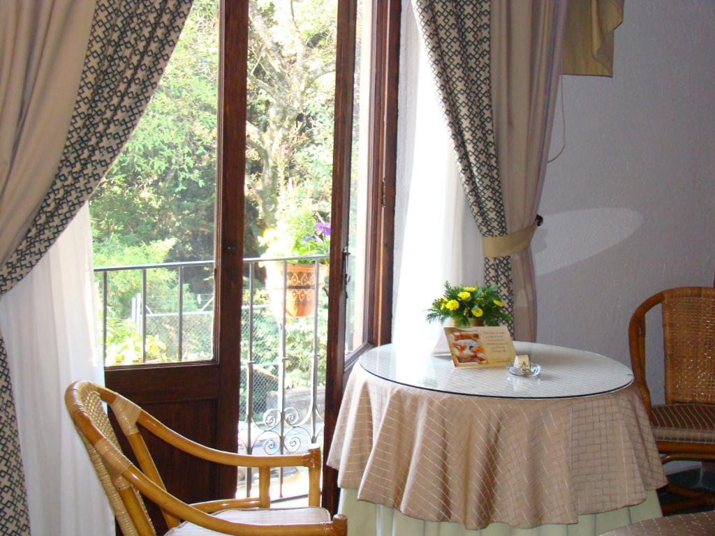 Posezení v ubytování Mansion del Cupatitzio