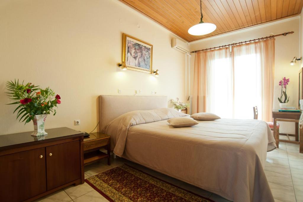 Cama o camas de una habitación en Hermes Delphi Hotel