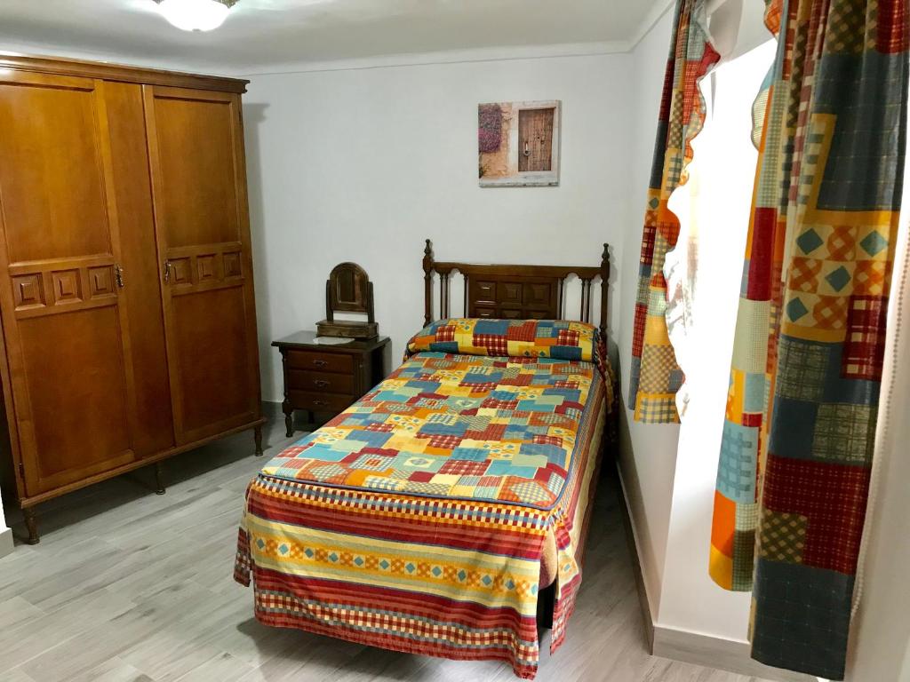 Cama o camas de una habitación en Casa Rural Setenil