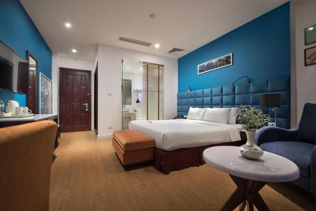 Postel nebo postele na pokoji v ubytování Hanoi Brilliant Hotel & Spa