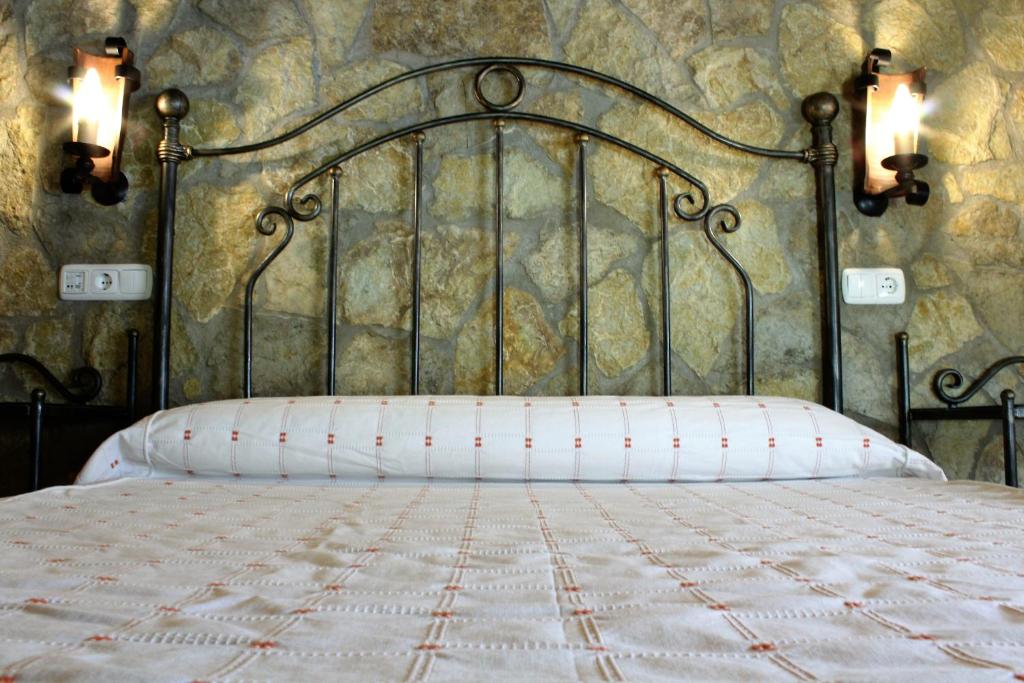 Postel nebo postele na pokoji v ubytování El Ventorro Hospederia Rural