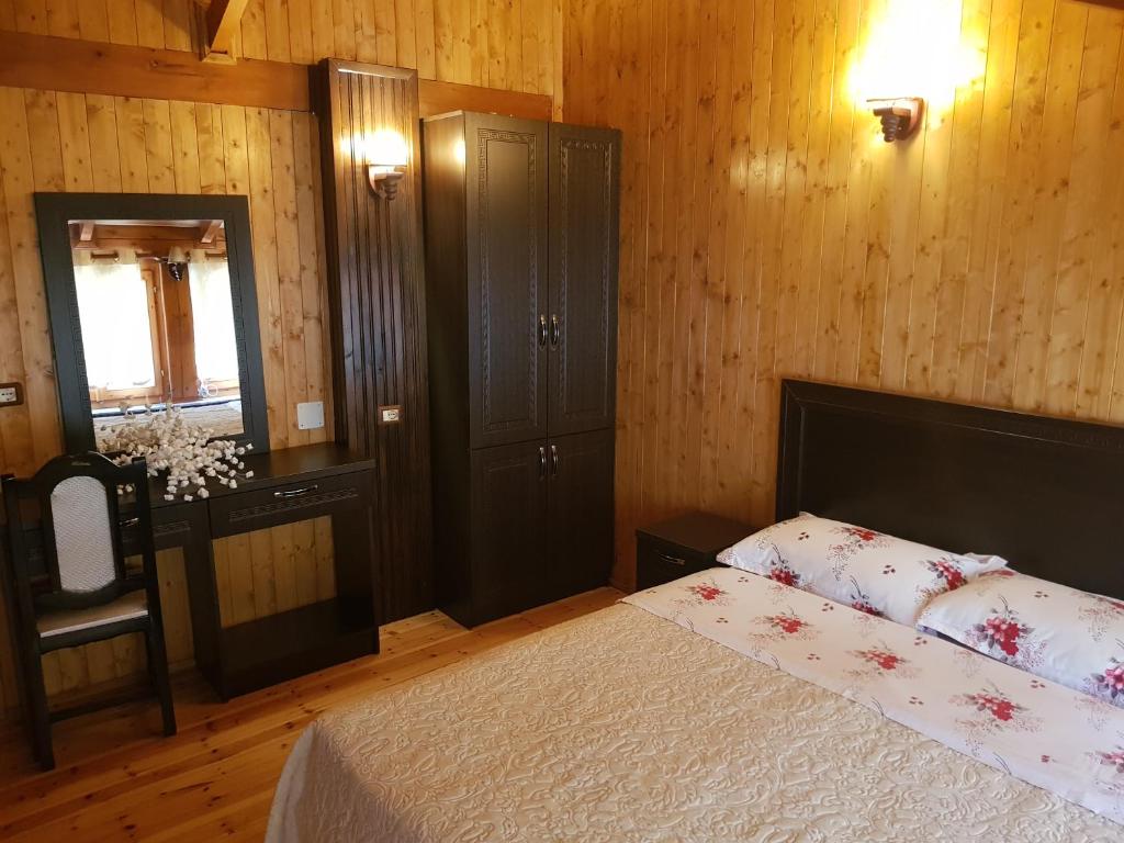 Postel nebo postele na pokoji v ubytování Hotel Vataksi