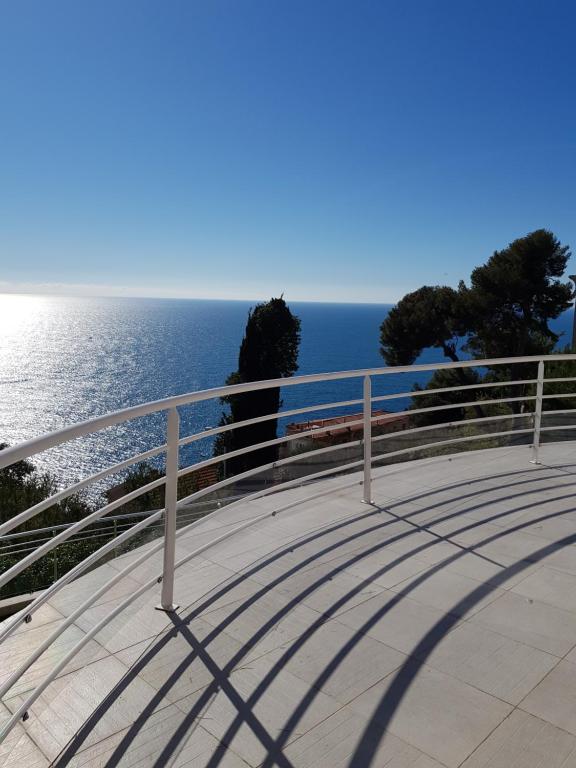 a view of the ocean from a balcony at Vue mer.Tranquilité.Cap d'Ail à 10 mn de MONACO in Cap d'Ail