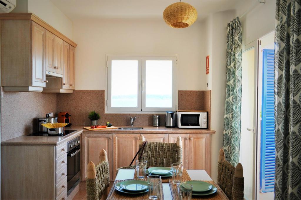 Kuchyň nebo kuchyňský kout v ubytování Siamoformentera Donatella