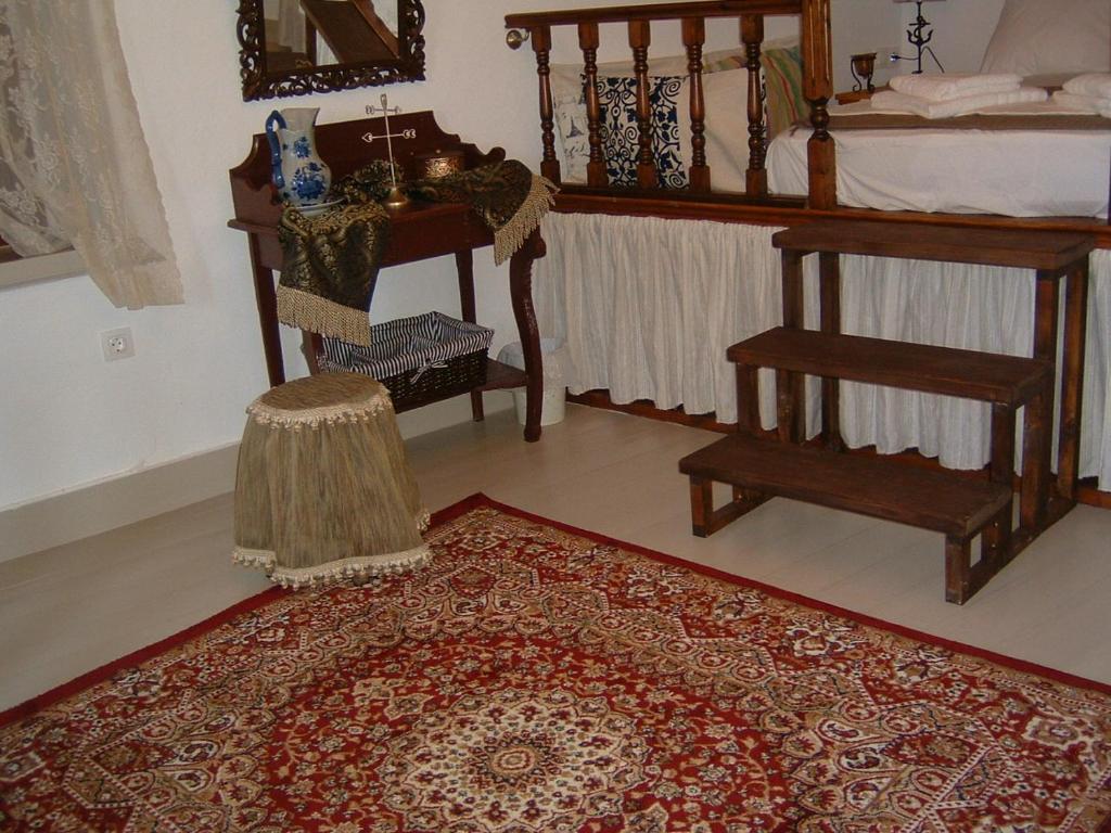 Postel nebo postele na pokoji v ubytování Yiayia's Home