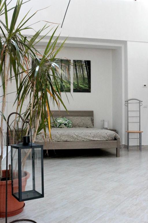 Postel nebo postele na pokoji v ubytování Paradeisos Residence Sas